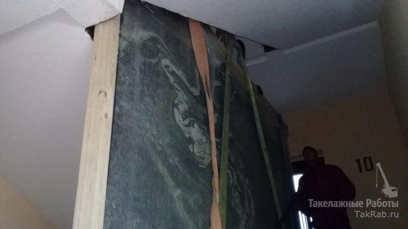 Подъем мраморной плиты на 20 этаж.